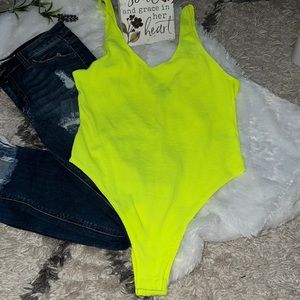 Neon yellow tank strap bodysuit